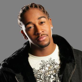 Who was Omarion raised by?